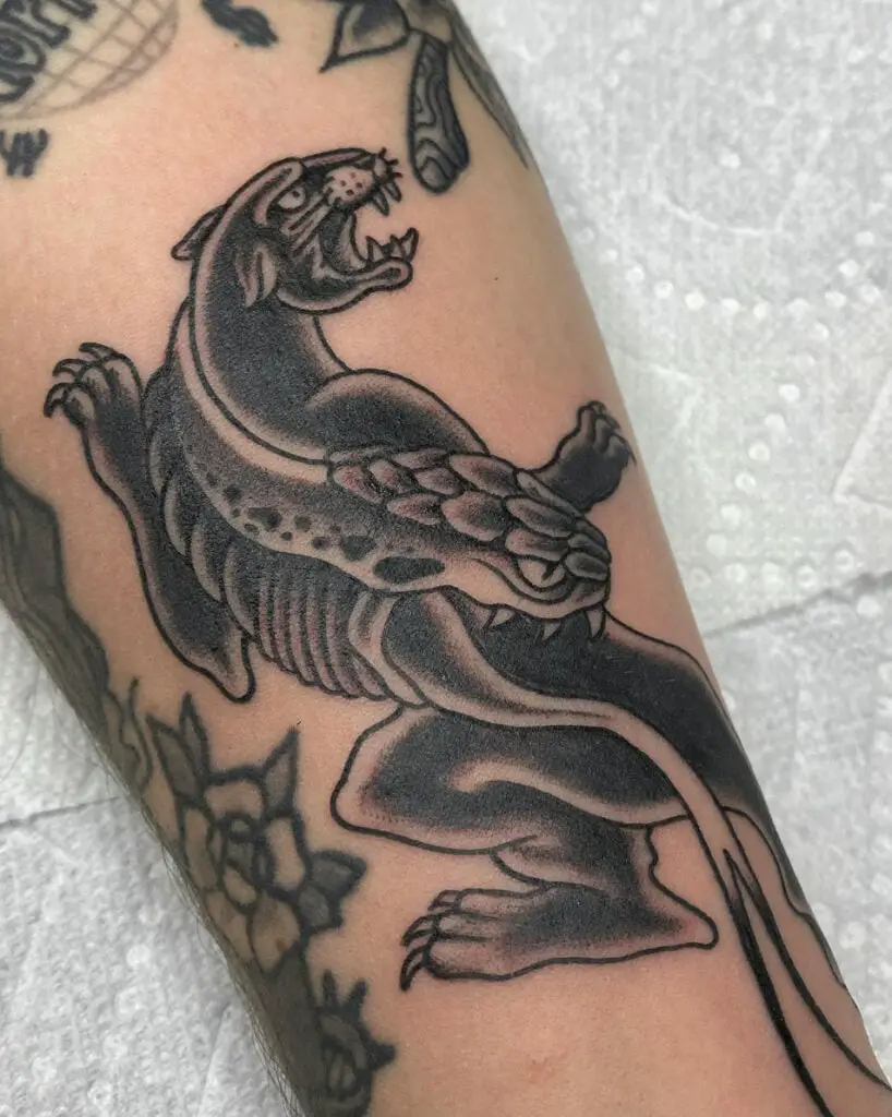 Black and Grey Snake Panther Arm Tattoo