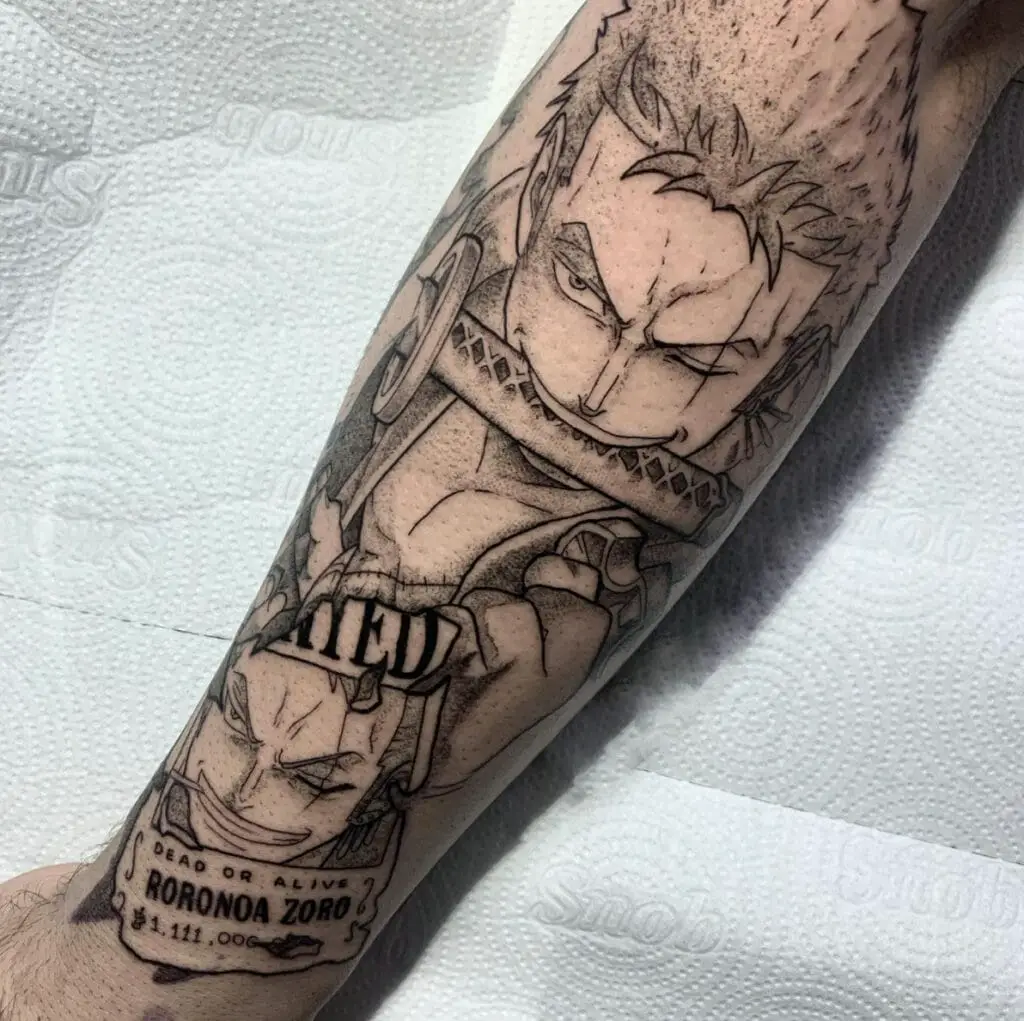Black and Grey Zoro Biting His Sword WIth Wanted Poster Arm Tattoo
