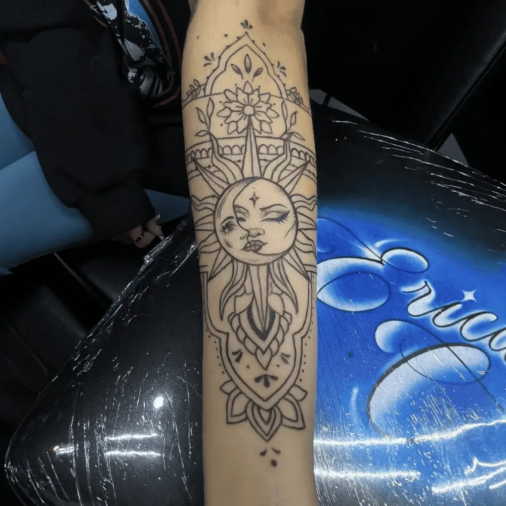 Blending Sun and Moon Kissing Floral Arm Tattoo