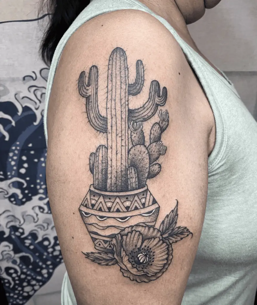 Cactus Plant in Aztec Pot and a Poppy Flower Upper Arm Tattoo