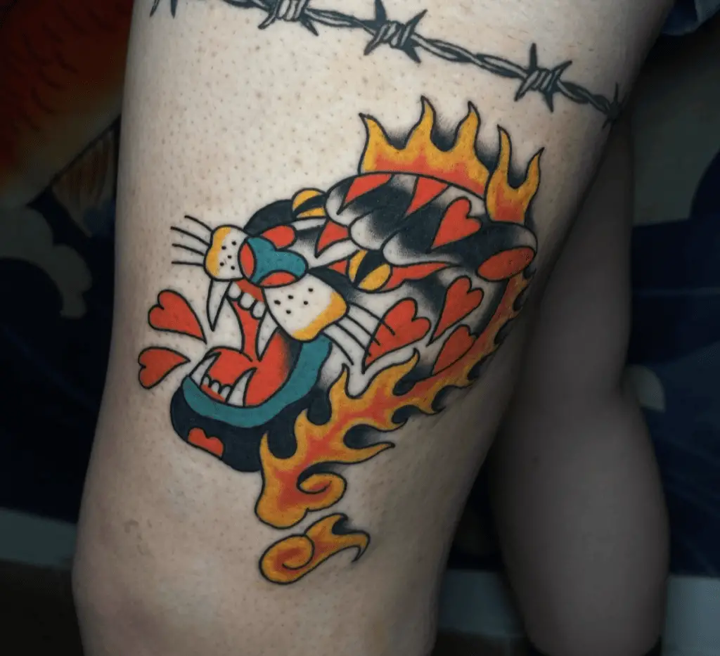 Colored Black Panther Head With Flames and Hearts Thigh Tattoo