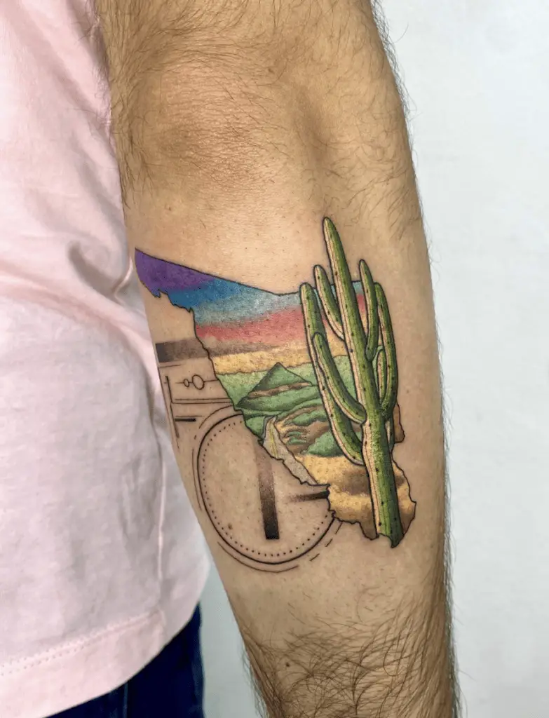 Colored Cactus in Landscape Paper Tear Arm Tattoo