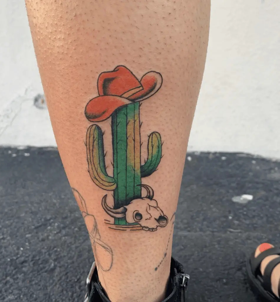 Colored Cowboy Hat on Cactus With Cow Skull Leg Tattoo