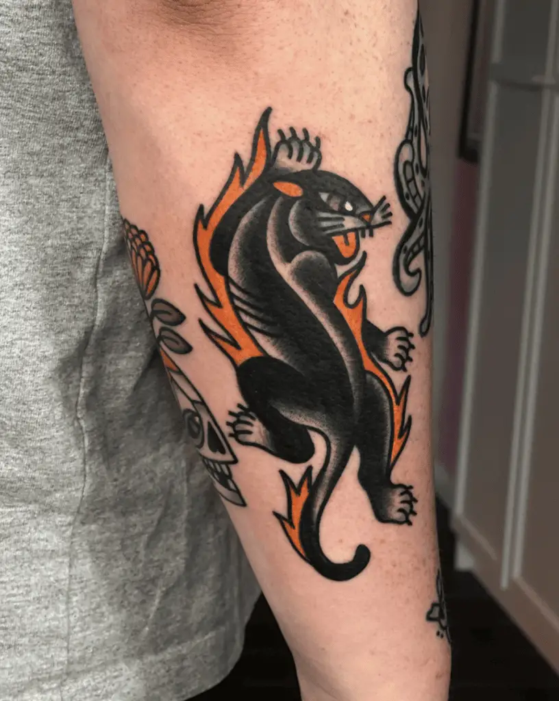 Colored Crawling Fire Panther Arm Tattoo