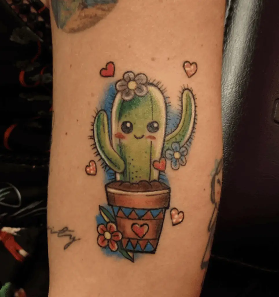 Colored Cute Cartoon Cactus WIth Hearts and Flowers Arm Tattoo