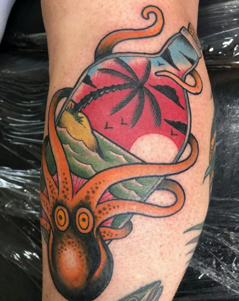 Colored Giant Octopus Holding the Tropical Beach in Bottle Leg Tattoo