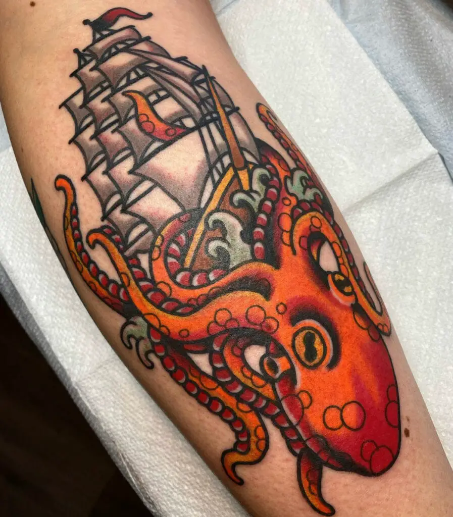 Colored Kraken Hangging on the Pirate Ship Arm Tattoo