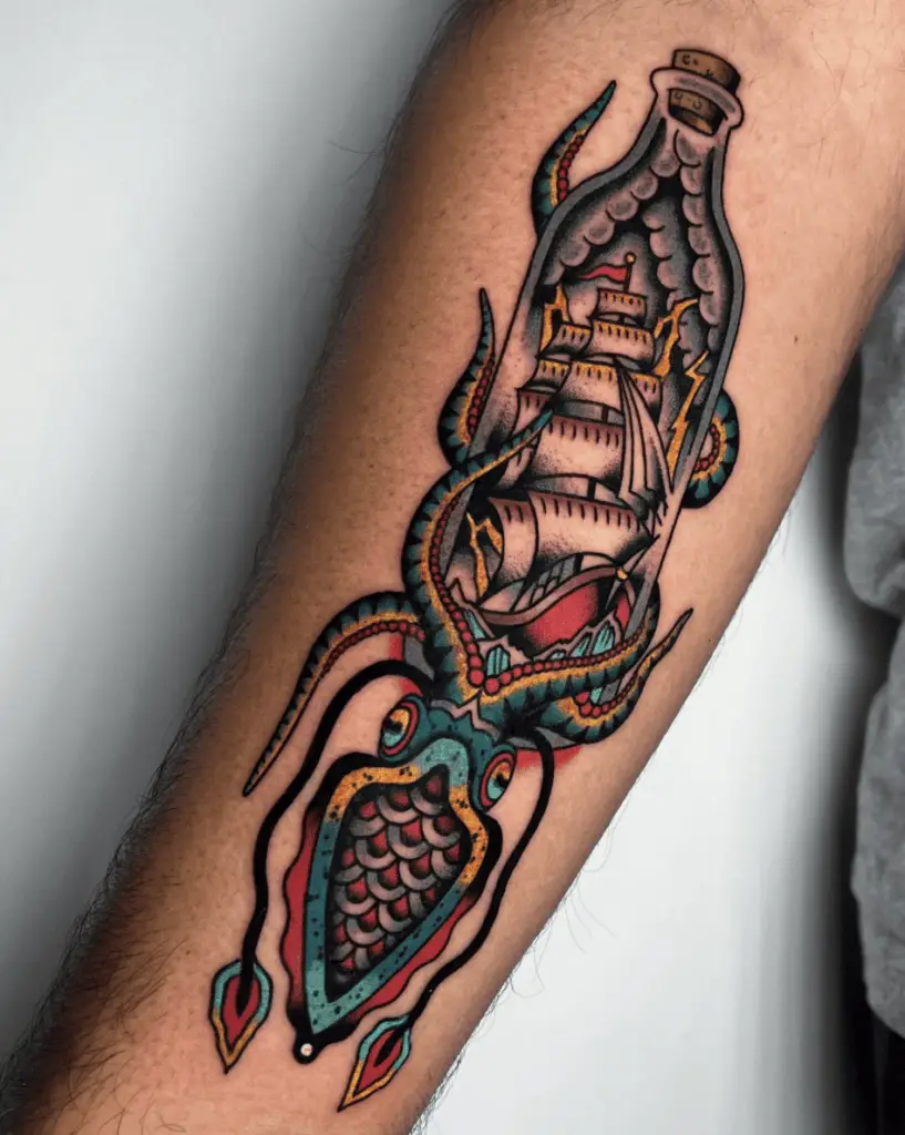 Colored Kraken Holding the Ship in Bottle Arm Tattoo