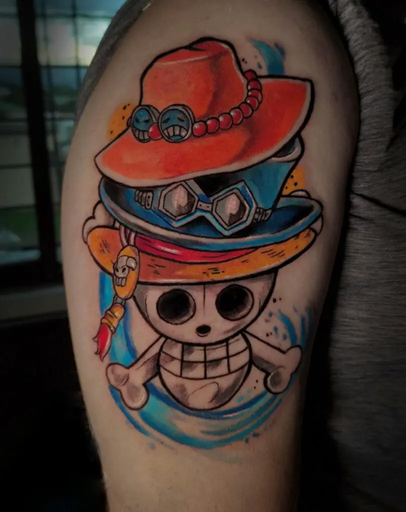 Colored Pirate Skull Wearing Ace, Sabo and Luffy Hats Upper Arm Tattoo
