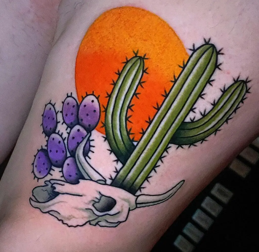 Colored Two Cactus With Cow Skull and Orange Sun Background Upper Arm Tattoo
