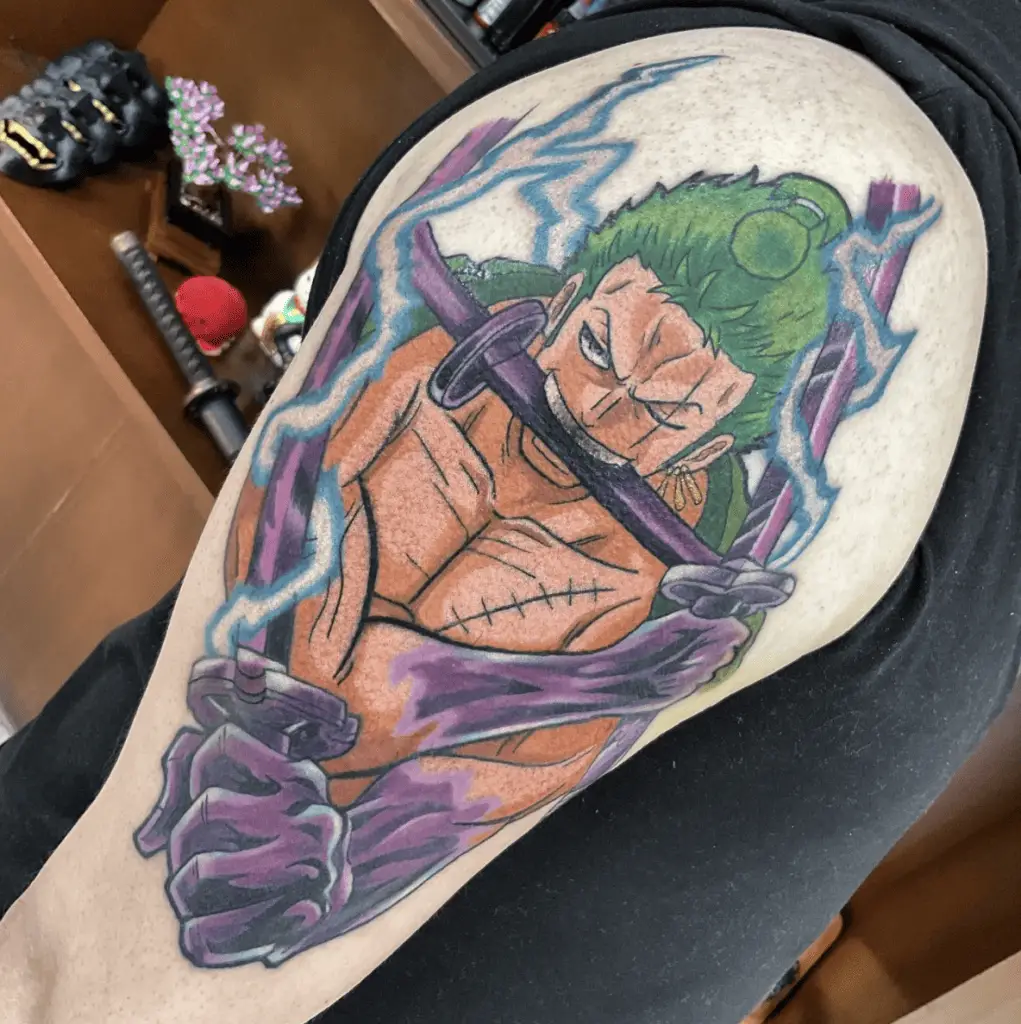 Colored Zoro in Fighting Pose With Lightning Effects Upper Arm Tattoo