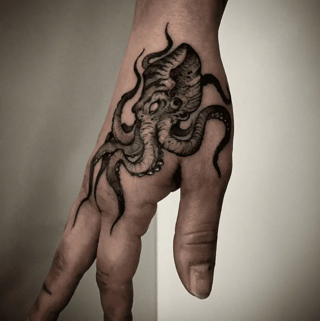 Detailed Line Work Small Kraken Hand Tattoo