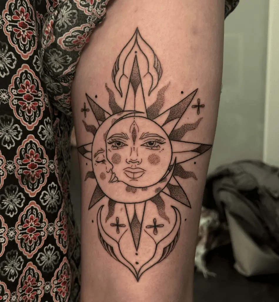 Dot Work Ornamental Sun and Moon Faces Arm Tattoo