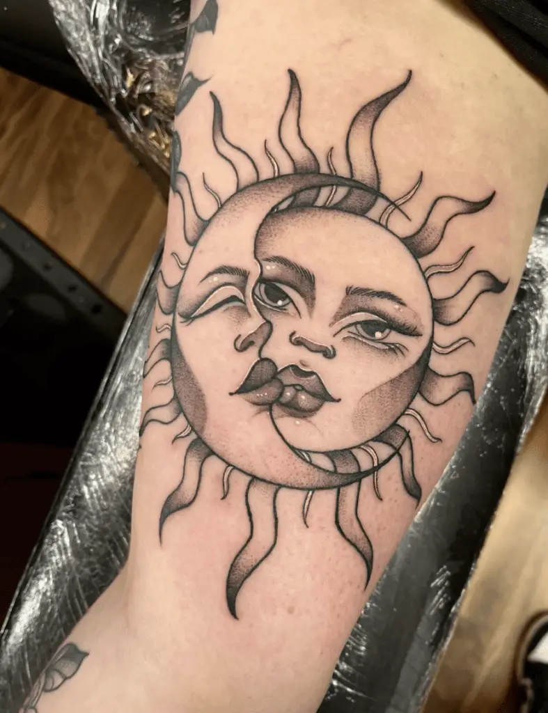 Female Sun and Crescent Moon Thigh Tattoo