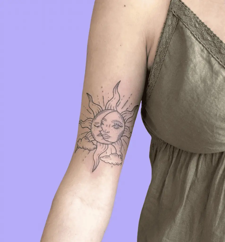 Fine Line Sun and Moon Face With Clouds Arm Tattoo