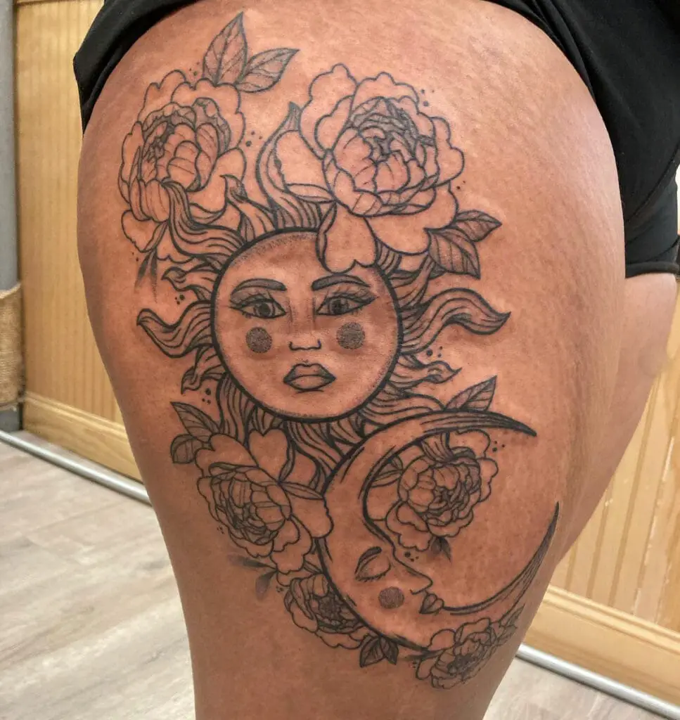 Floral Sun and Cresent Moon With Face Thigh Tattoo