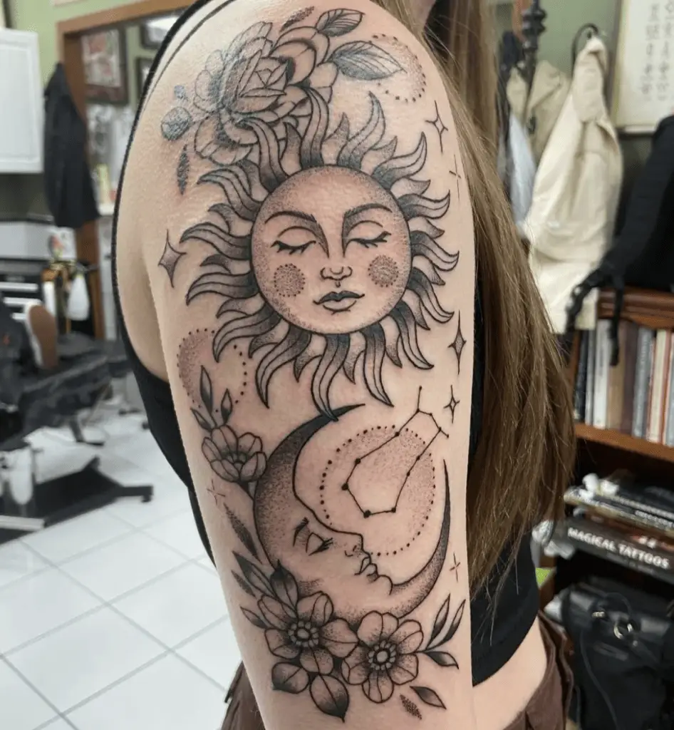 Floral Sun and Moon With Constellations Arm Tattoo