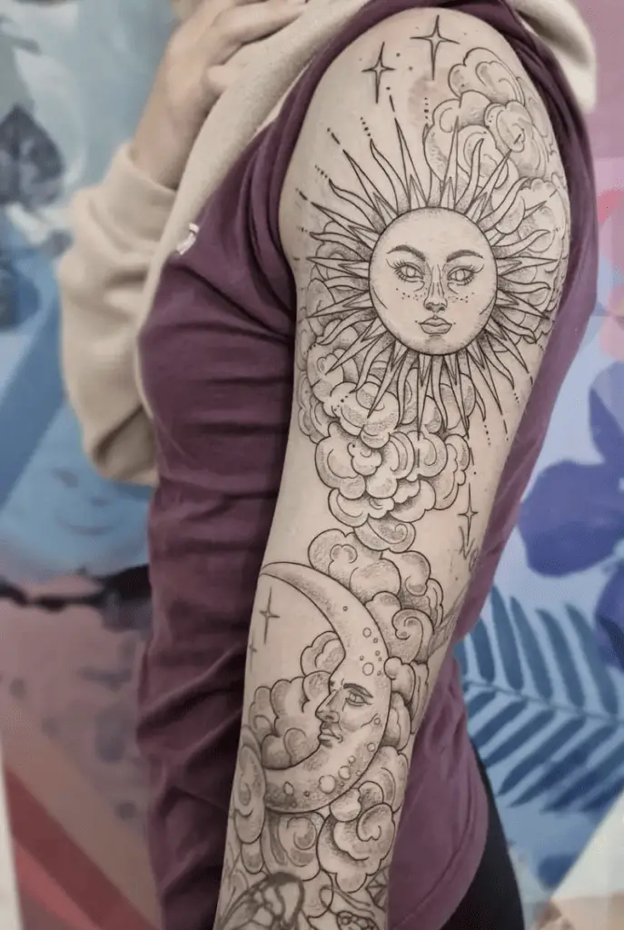 Full Sleeve Artistic Sun and Moon Surrounded by Clouds and Stars Arm Tattoo