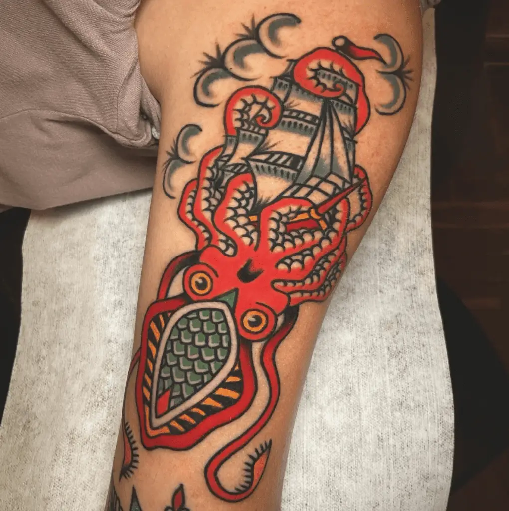 Giant Red Squid Holding the Ship at Cloudy Day Upper Arm Tattoo