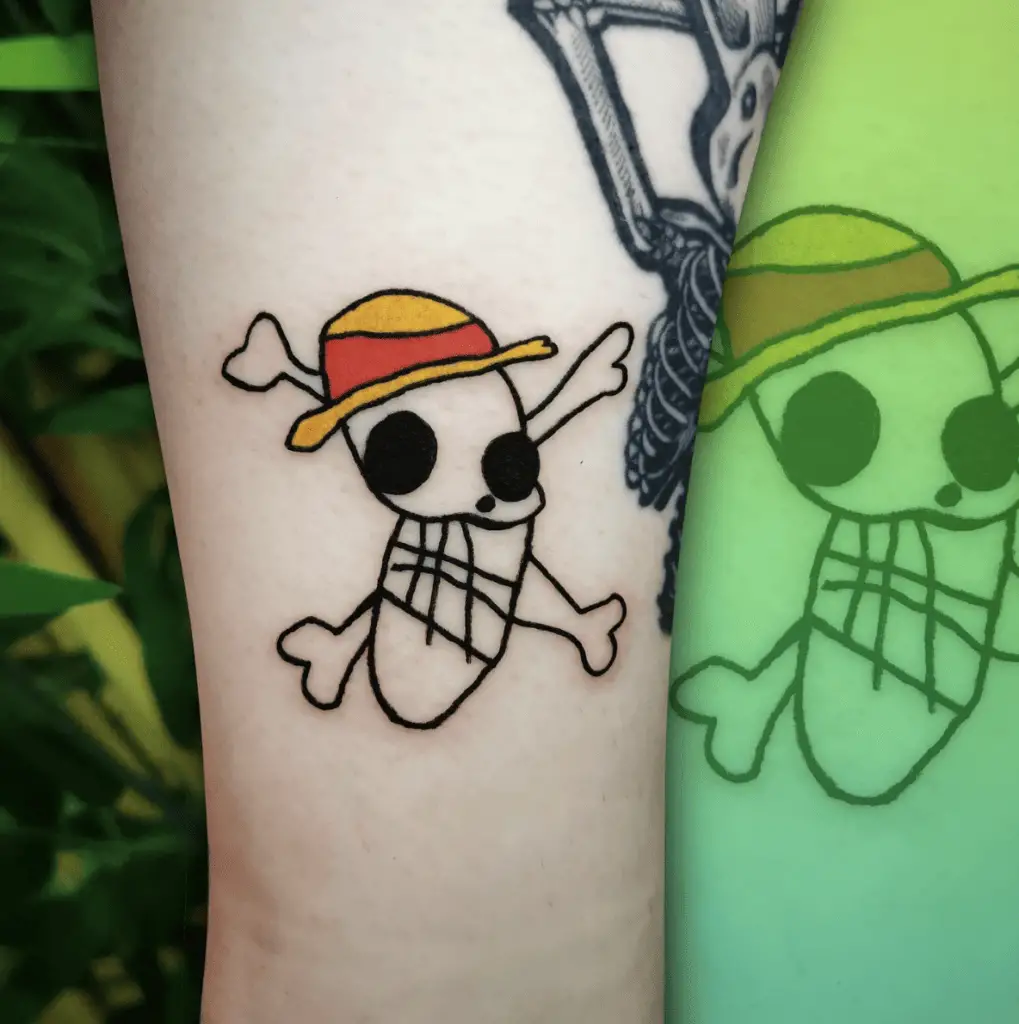 Hand Drawn Pirate Skull With Colored Straw Hat Arm Tattoo