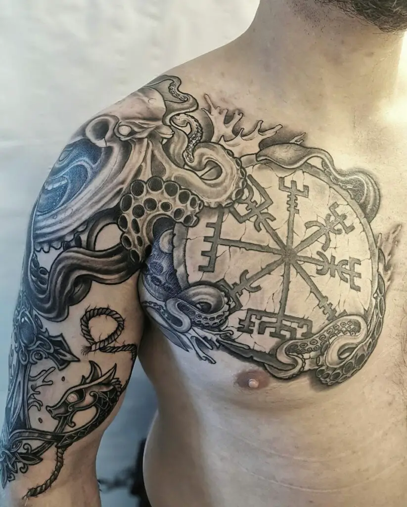 Kraken Holding the Symbol Stone Chest Tattoo