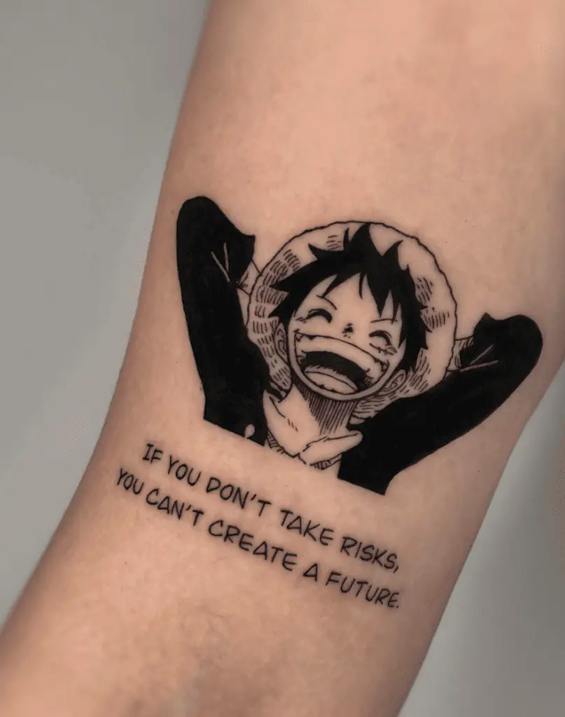 Luffy Laughing While Hands Behind Head With Word Phrase Text Arm Tattoo