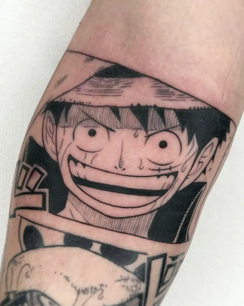 Luffy Smiling Manga Panel Arm Tattoo