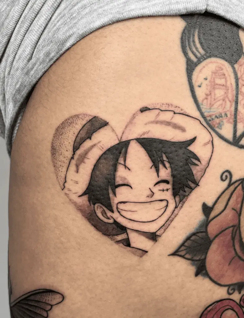 Luffy Smiling in Heart Shape Frame Thigh Tattoo