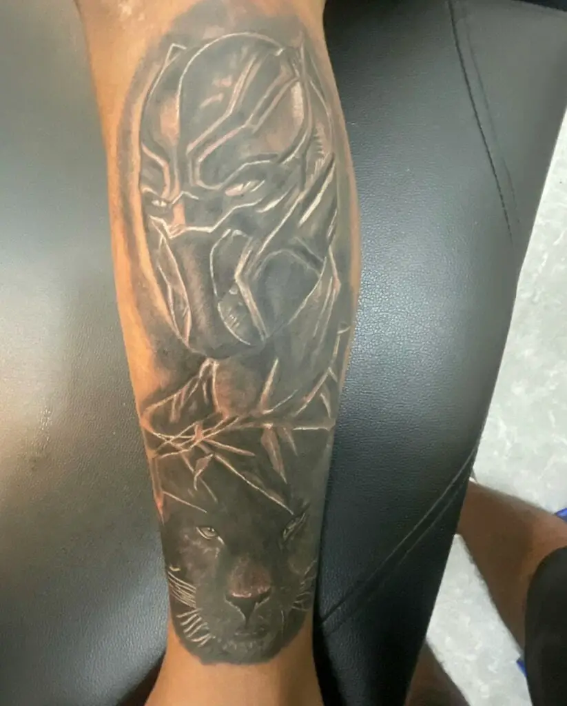 Main Character From the Movie Black Panther and Below an Animal Black Panther Arm Tattoo