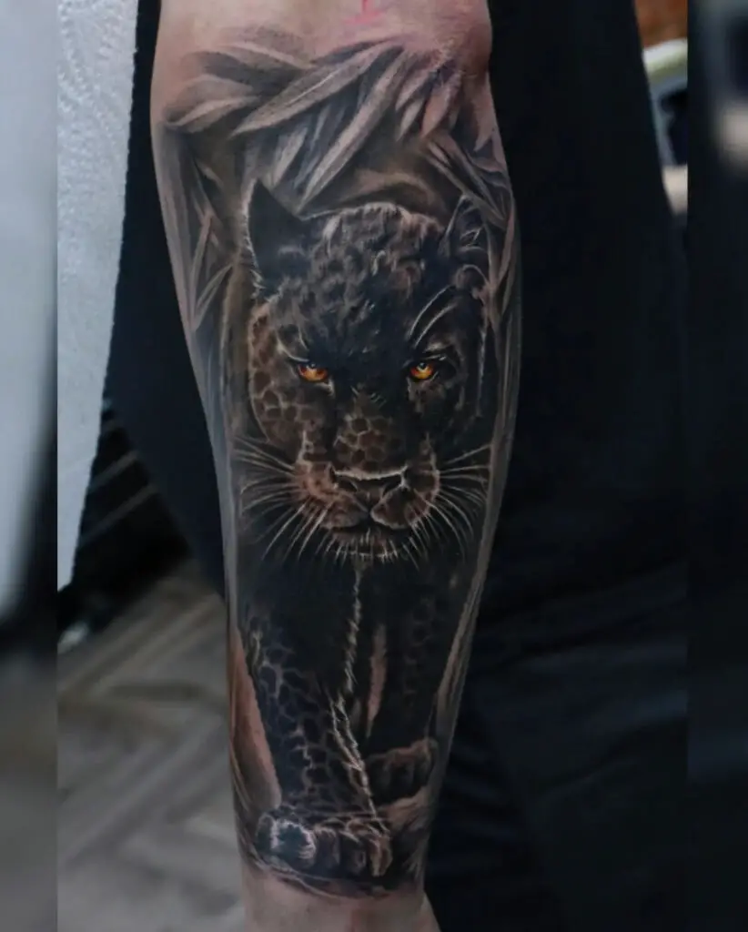 Menacing Black Panther Approaching Arm Tattoo