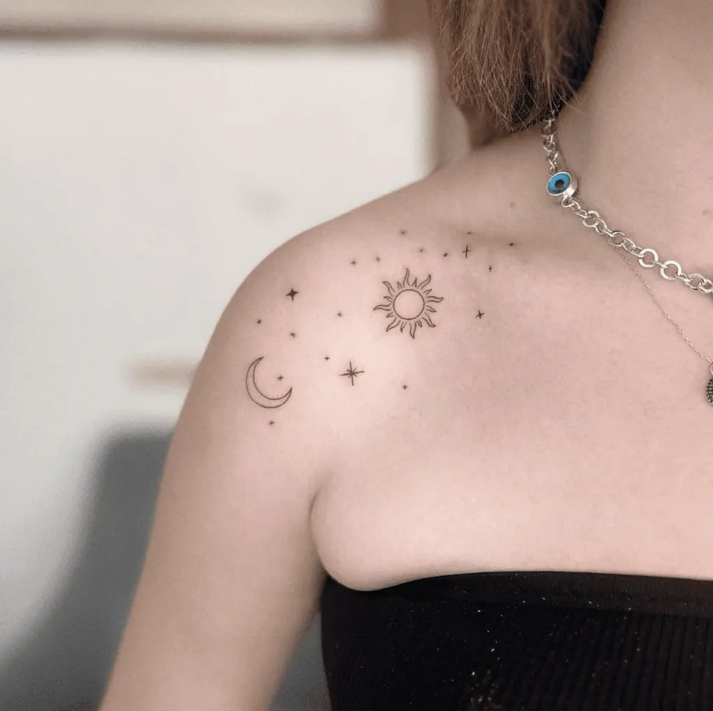 Minimalist Sun and Cresent Moon With Stars Shoulder Tattoo