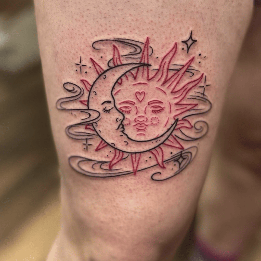 Outline Red Sun and Black Crescent Moon Sleeping Faces With Wind Swirl and Sparkles Leg Tattoo