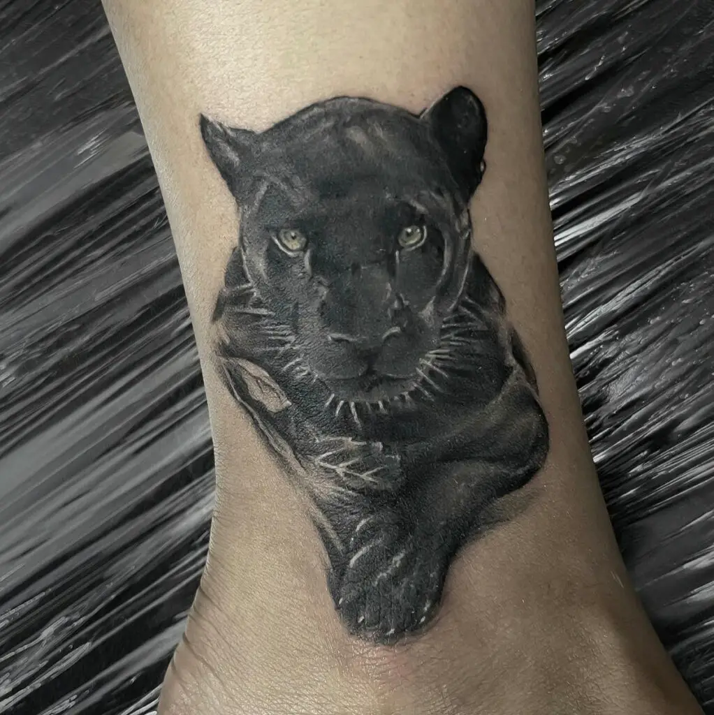Portrait of Black Panther Resting Ankle Tattoo