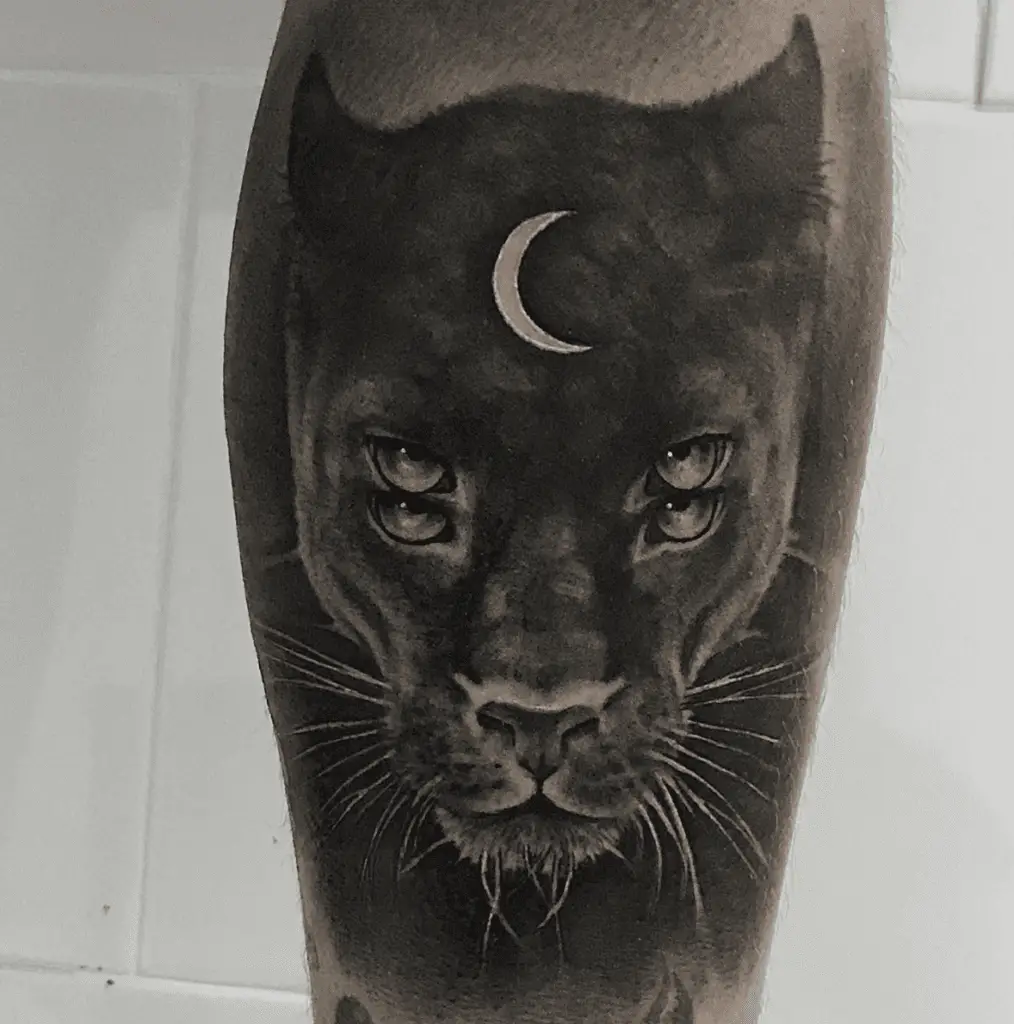 Realistic Black Panther With Double Eyes and Crescent Moon on it's Forehead Leg Tattoo