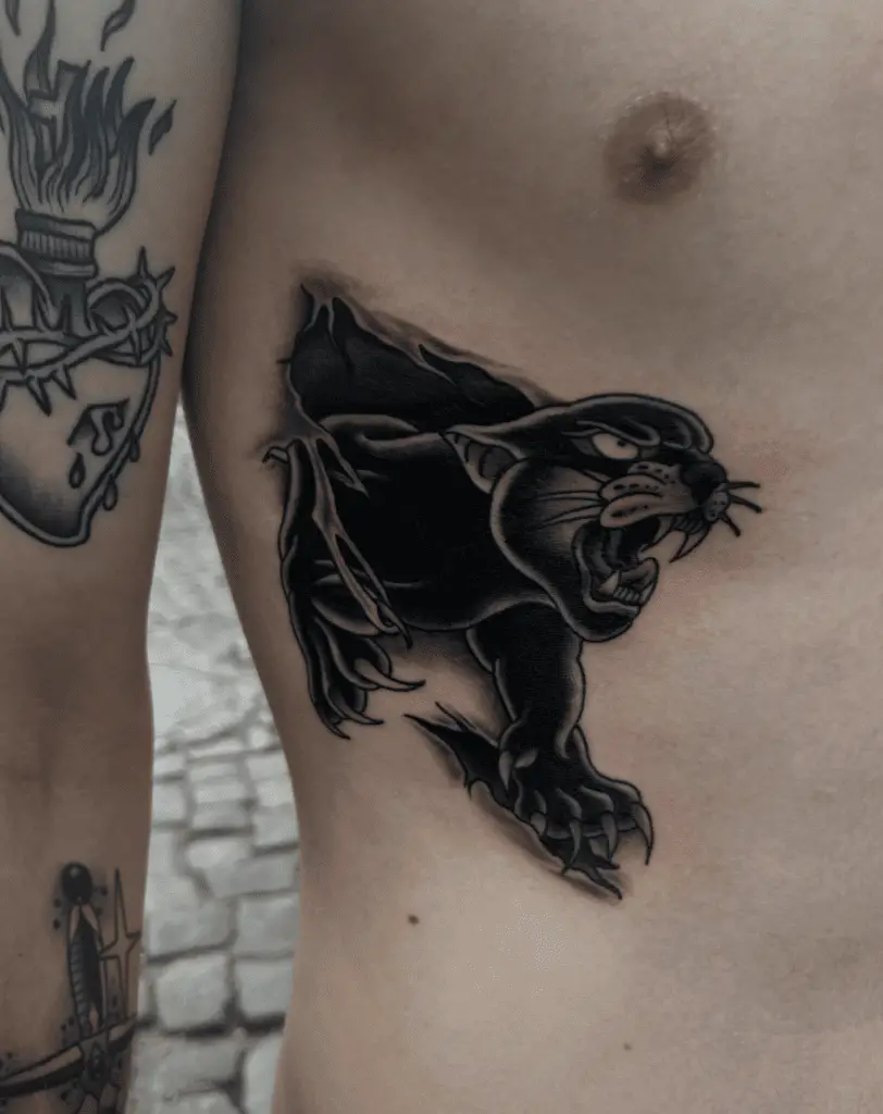 Realistic Crawling Black Panther Rib Tattoo