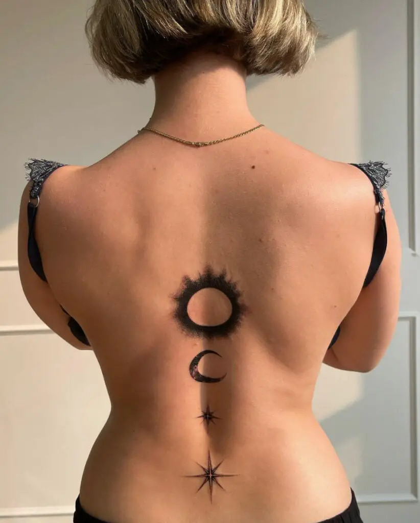 Sun, Moon and Stars Vertically Aligned Back Tattoo
