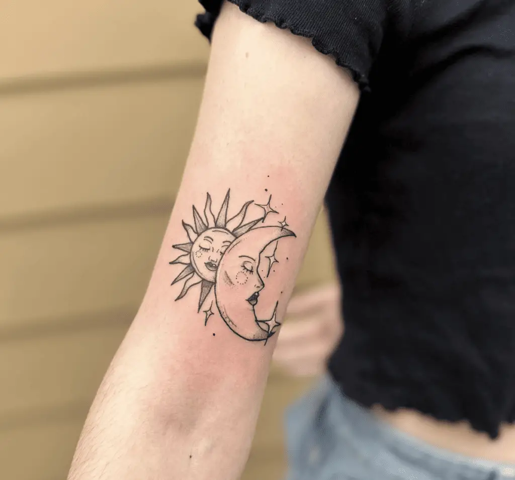 Sun and Moon Sleeping Faces With Sparkles Arm Tattoo