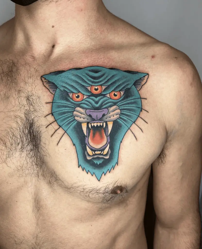 Three Eyed Blue Panther Head Chest Tattoo
