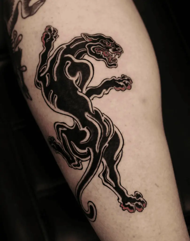 Wavy Black Panther With Red Details Leg Tattoo