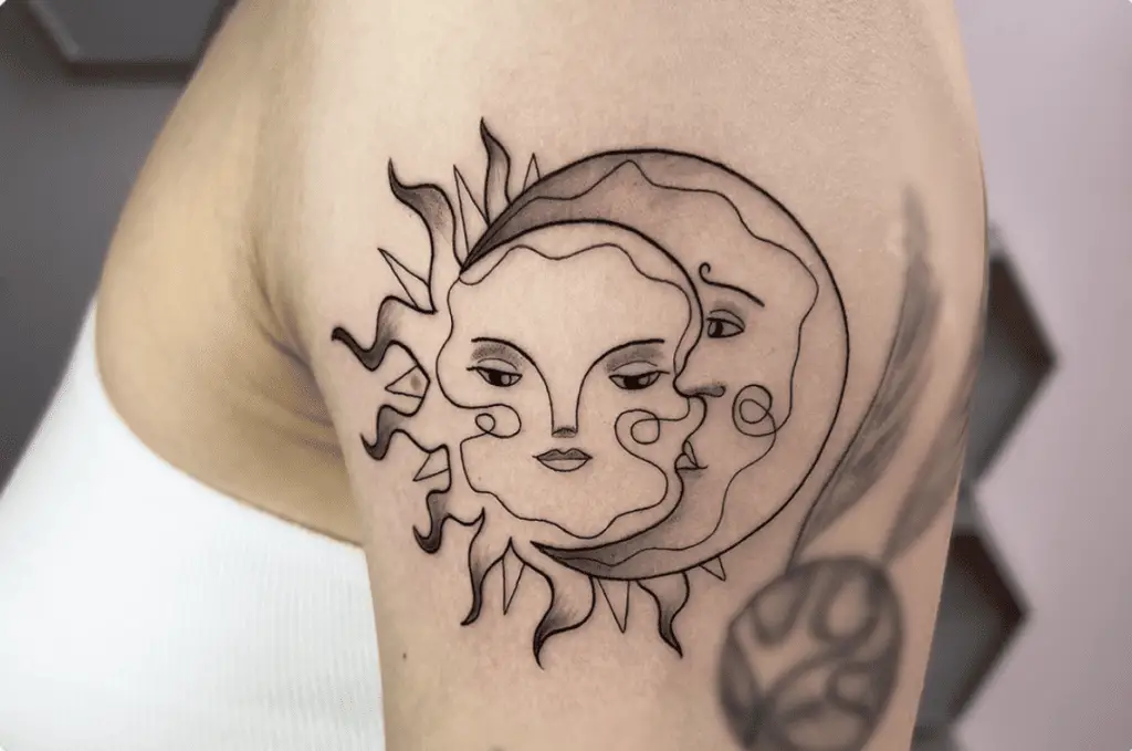 Wavy Lines Sun and Moon Faces Upper Arm Tattoo