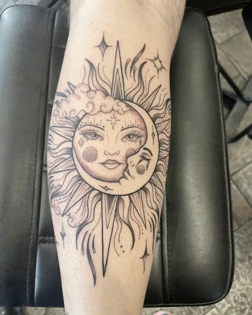 Wide Detailed Feminine Sun and Sleeping Moon With Clouds and Stars Arn Tattoo