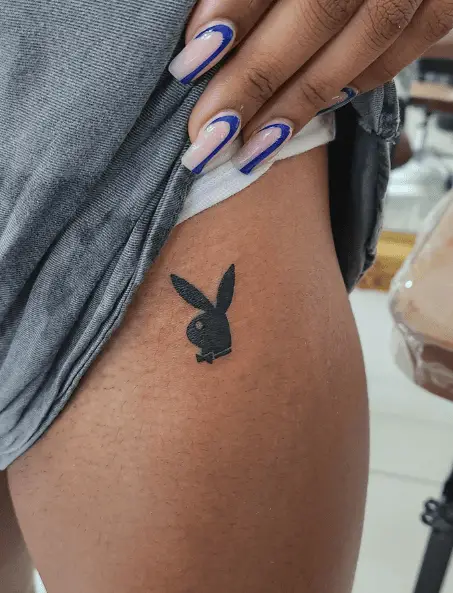 Small and Simple Bold Black Playboy Bunny Tattoo