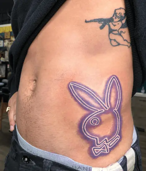 Neon Purple Playboy Bunny Hip Tattoo