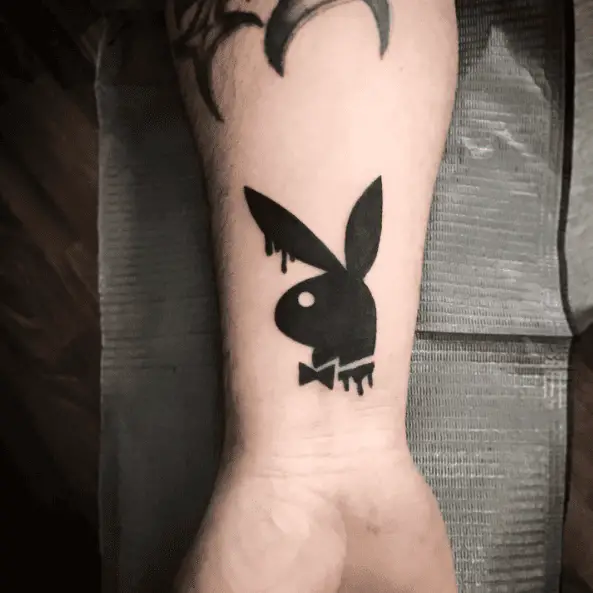 Bold Ink Dripping Playboy Bunny Tattoo