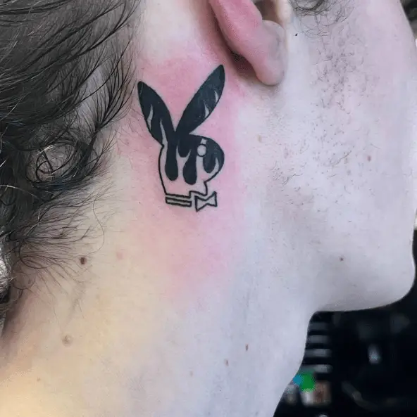 Black Flames Playboy Bunny Behind the Ear Tattoo