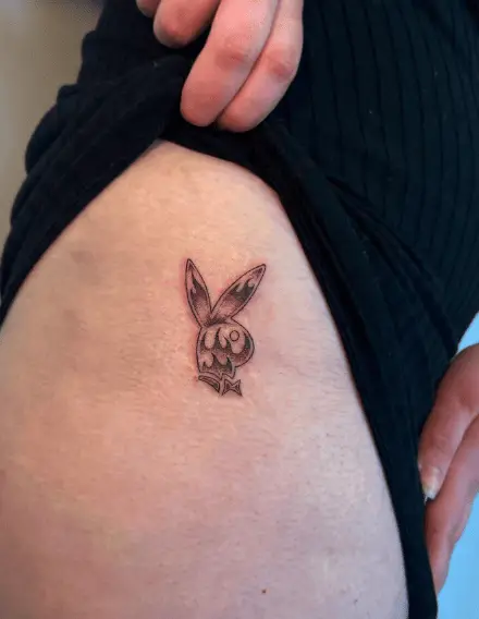 Greyish Flaming Bunny Thigh Tattoo