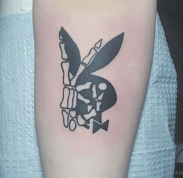 Playboy Bunny and Skeleton Hand Tattoo