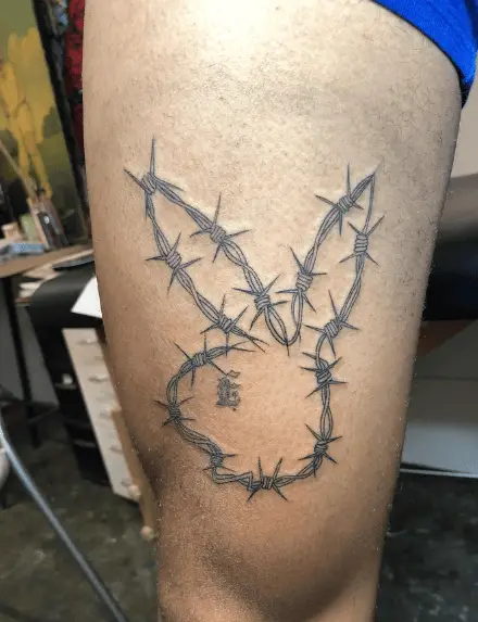 Grey Barbed Wire Playboy Bunny Tattoo