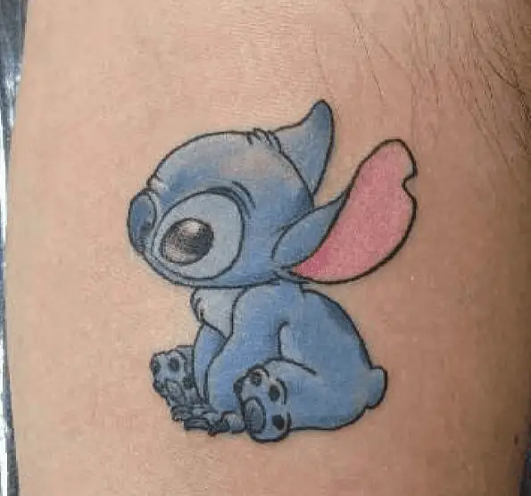 Blue Ink Stitch Tattoo