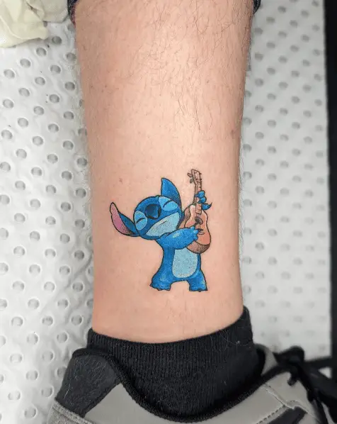 Blue Ink Stitch with Ukulele Ankle Tattoo